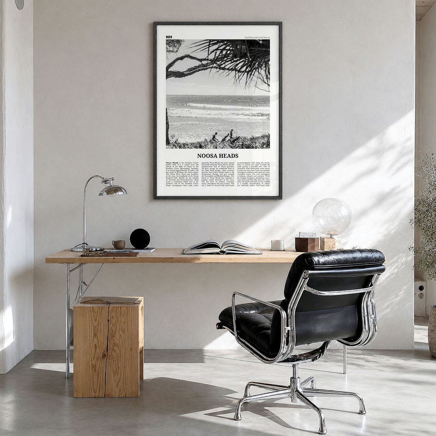 Noosa Heads Newspaper No 1 Poster in a black wood frame, hanging in a bright home office
