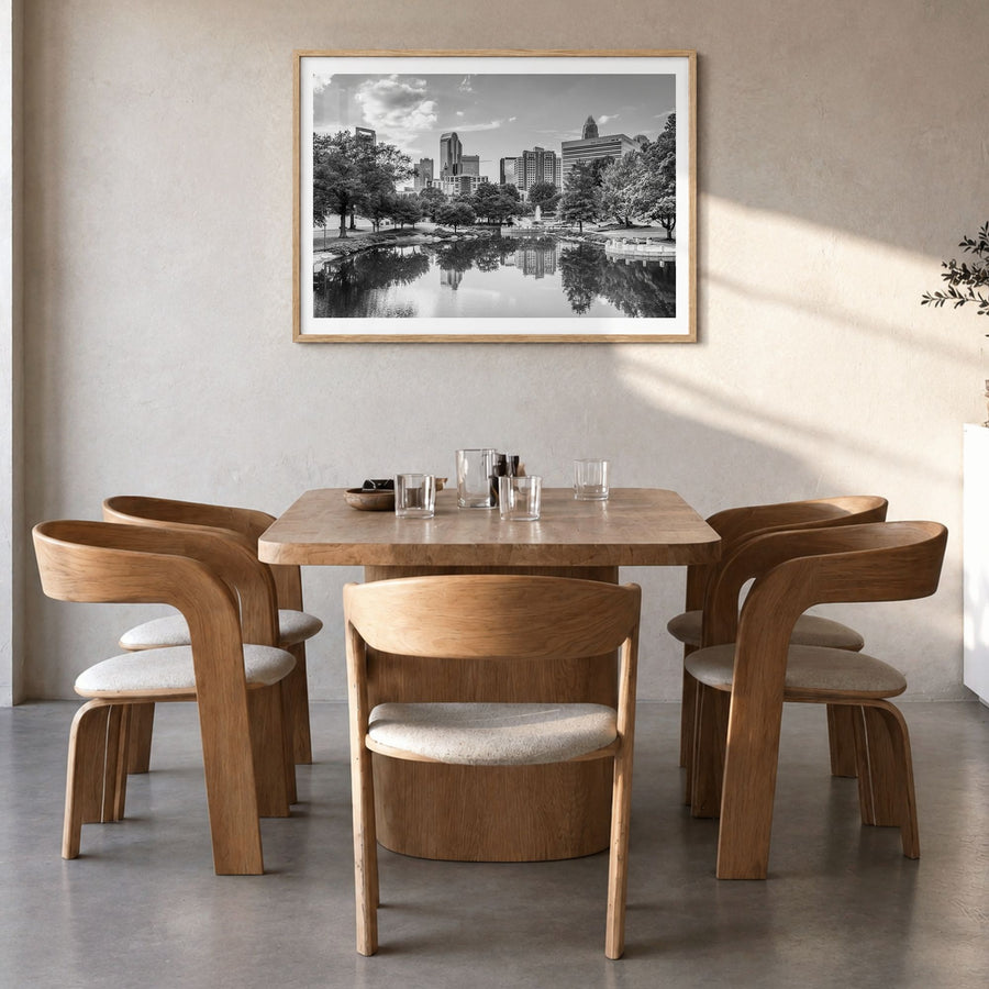 North Carolina Photo Poster in a natural wood frame, hanging in a dining room, white border