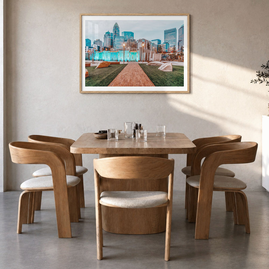 North Carolina Photo Poster in a natural wood frame, hanging in a dining room, white border