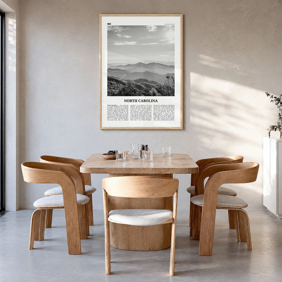 North Carolina Newspaper No 2 Poster in a natural wood frame, hanging in a dining room