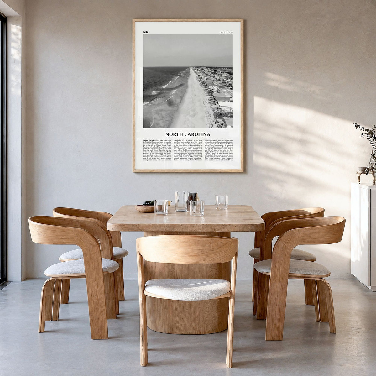 North Carolina Newspaper No 4 Poster in a natural wood frame, hanging in a dining room