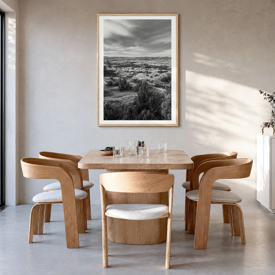 North Dakota Photo Poster in a natural wood frame, hanging in a dining room, white border