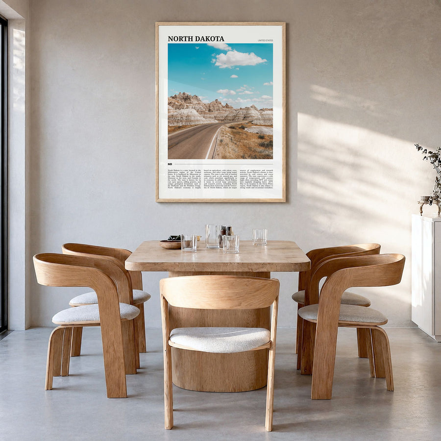 North Dakota Travel Poster in a natural wood frame, hanging in a dining room