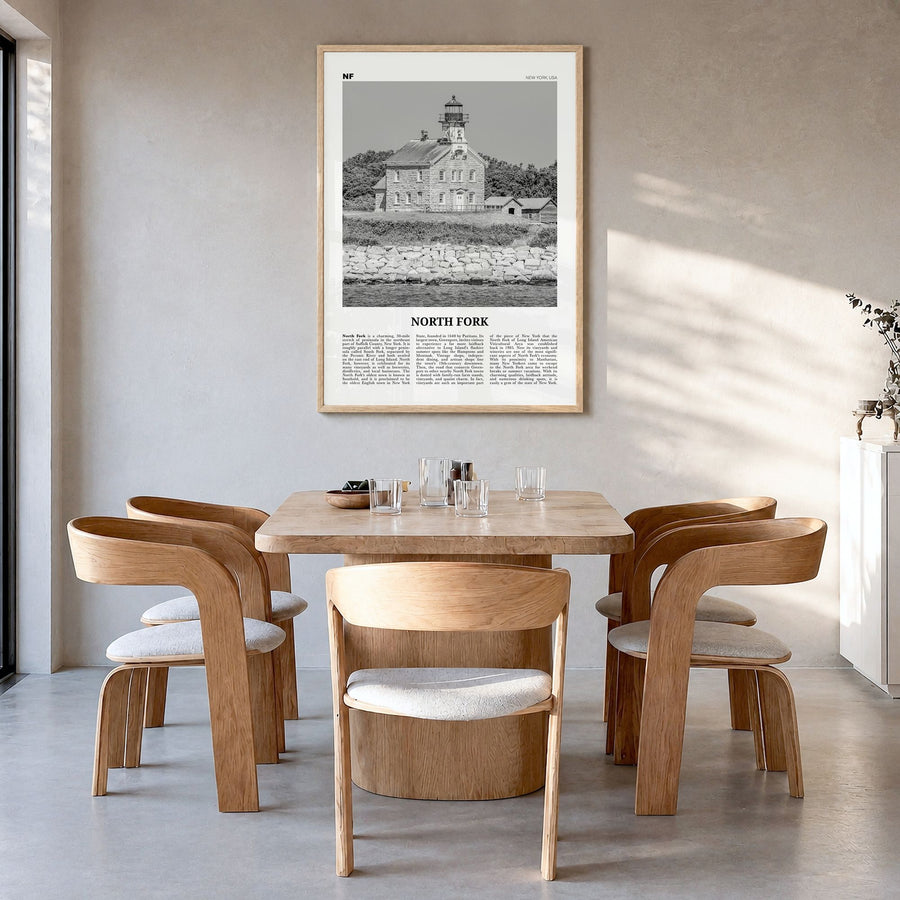 North Fork Newspaper Poster in a natural wood frame, hanging in a dining room