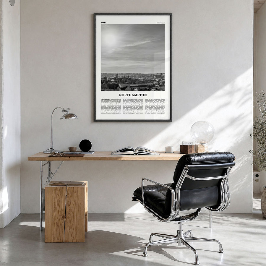 Northampton Newspaper Poster in a black wood frame, hanging in a bright home office