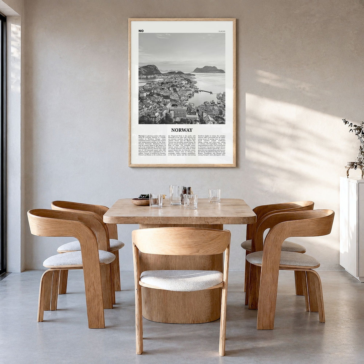 Norway Newspaper Poster in a natural wood frame, hanging in a dining room