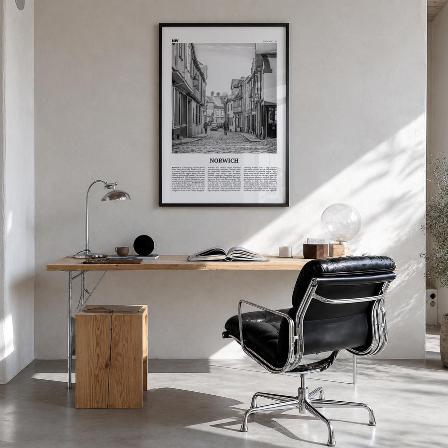 Norwich black & white newspaper poster of England, UK – vertical wall art in black wood frame, hanging on wall