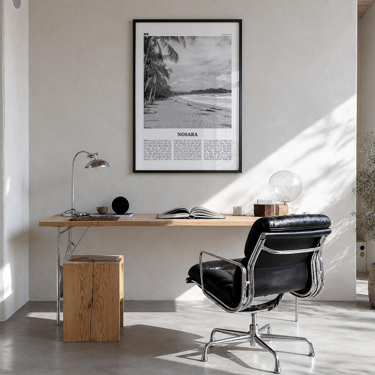 Nosara black & white newspaper poster of Costa Rica – vertical wall art in black wood frame, hanging on wall