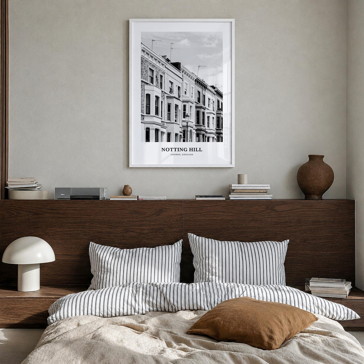 Notting Hill black & white classic poster of London, England – vertical wall art in white wood frame, hanging on wall