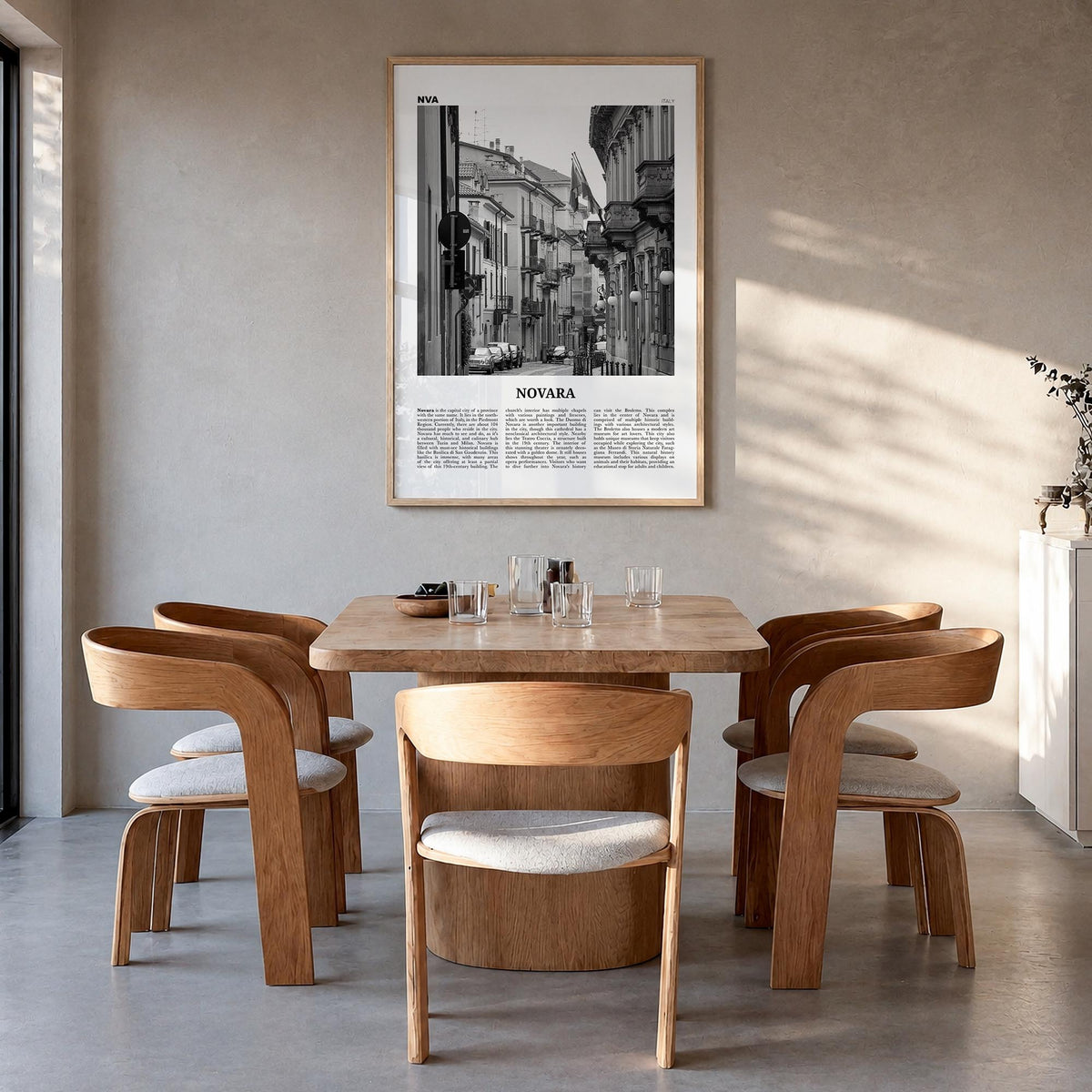 Novara black & white newspaper poster of Italy – vertical wall art in natural wood frame, hanging on wall