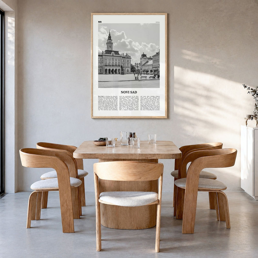 Novi Sad Newspaper Poster in a natural wood frame, hanging in a dining room