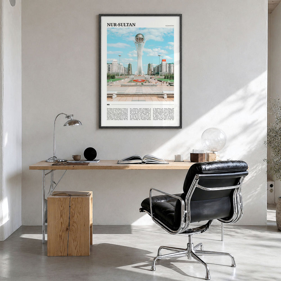 Nur-Sultan Travel Poster in a black wood frame, hanging in a bright home office