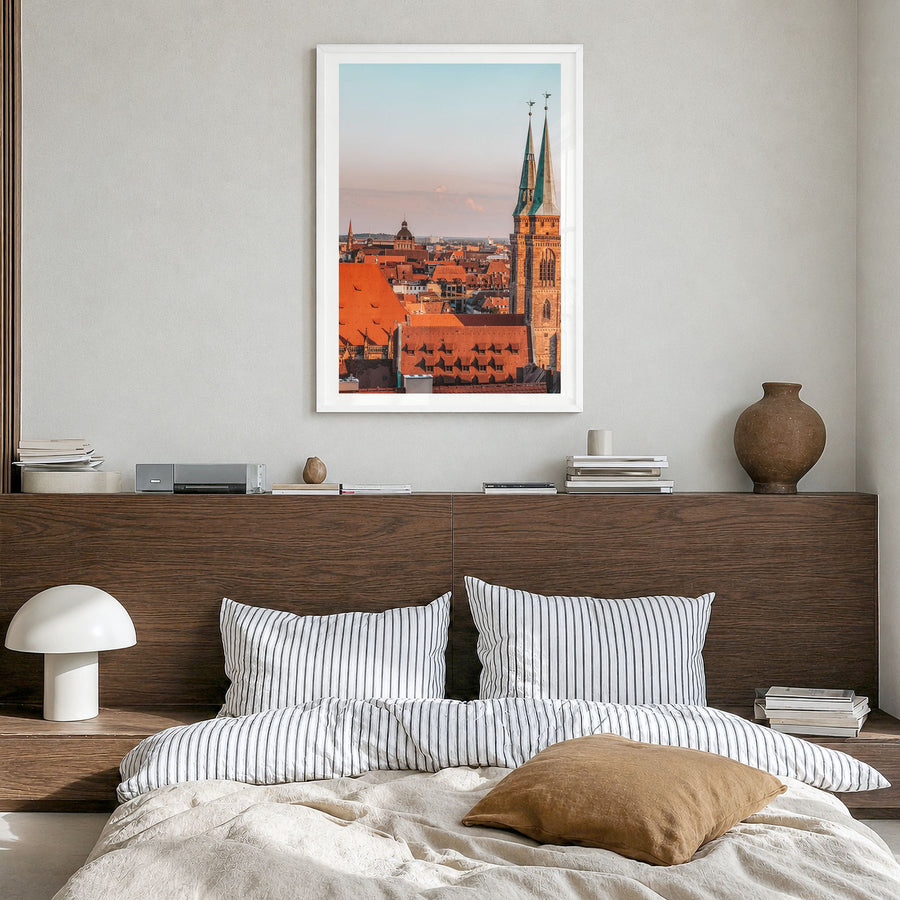Nuremberg Photo Poster in a white wood frame, hanging in a bedroom, white border