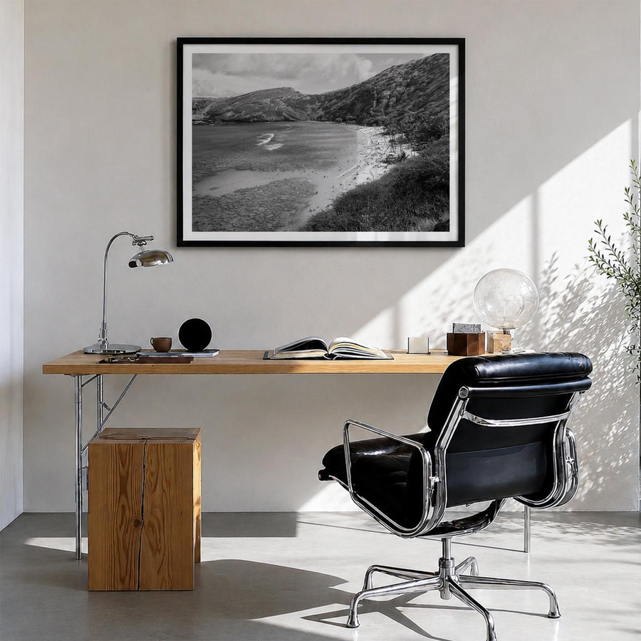 O‘ahu black & white photo poster of Hawaii, USA – horizontal wall art in black wood frame with white border, hanging on wall