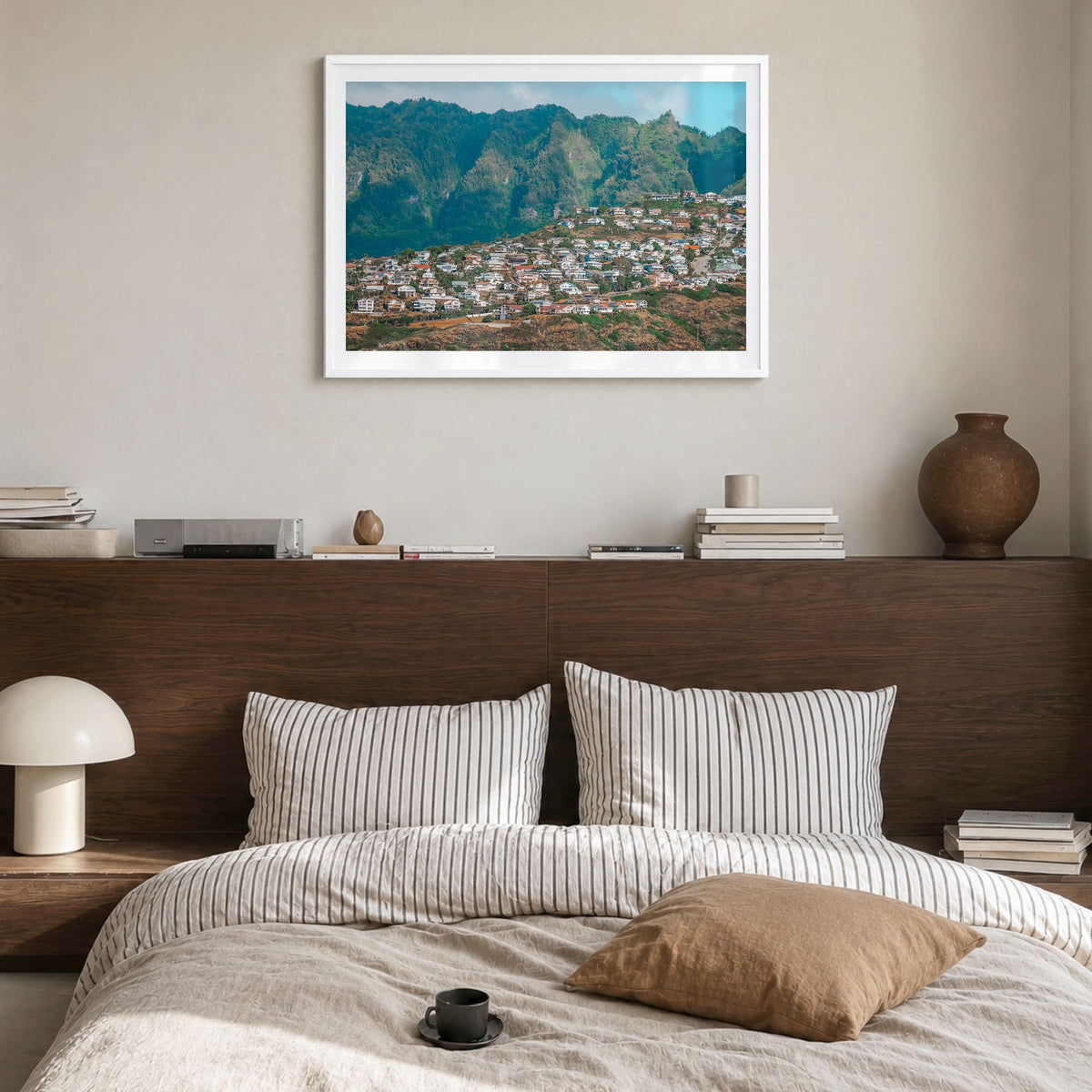 O‘ahu Photo Poster in a white wood frame, hanging in a bedroom, white border