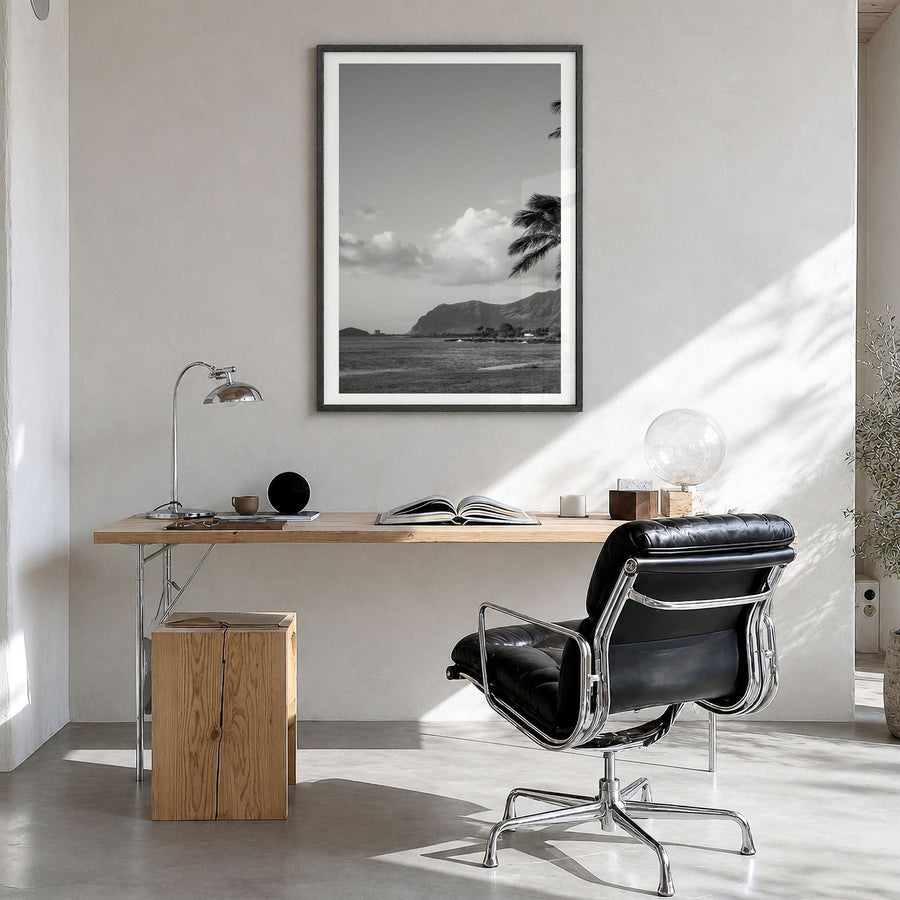 O‘ahu Photo No 1 Poster in a black wood frame, hanging in a bright home office, white border
