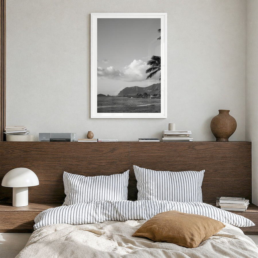 O‘ahu Photo No 1 Poster in a white wood frame, hanging in a bedroom, white border