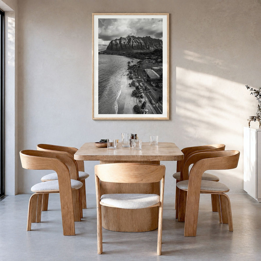 O‘ahu Photo No 3 Poster in a natural wood frame, hanging in a dining room, white border