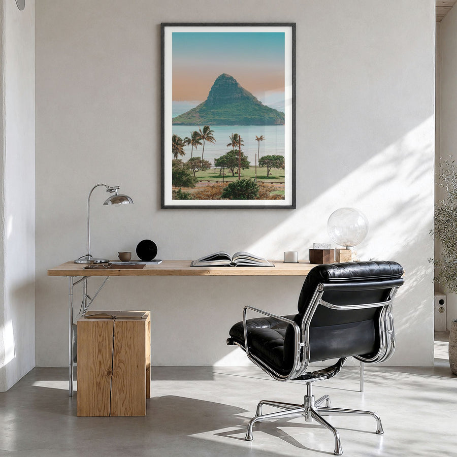 O‘ahu Photo No 1 Poster in a black wood frame, hanging in a bright home office, white border