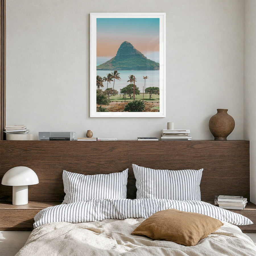 O‘ahu Photo No 1 Poster in a white wood frame, hanging in a bedroom, white border