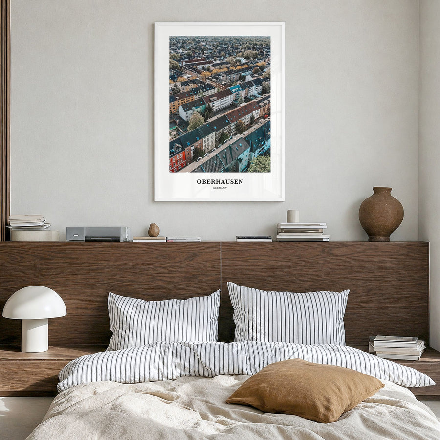 Oberhausen Classic Poster in a white wood frame, hanging in a bedroom
