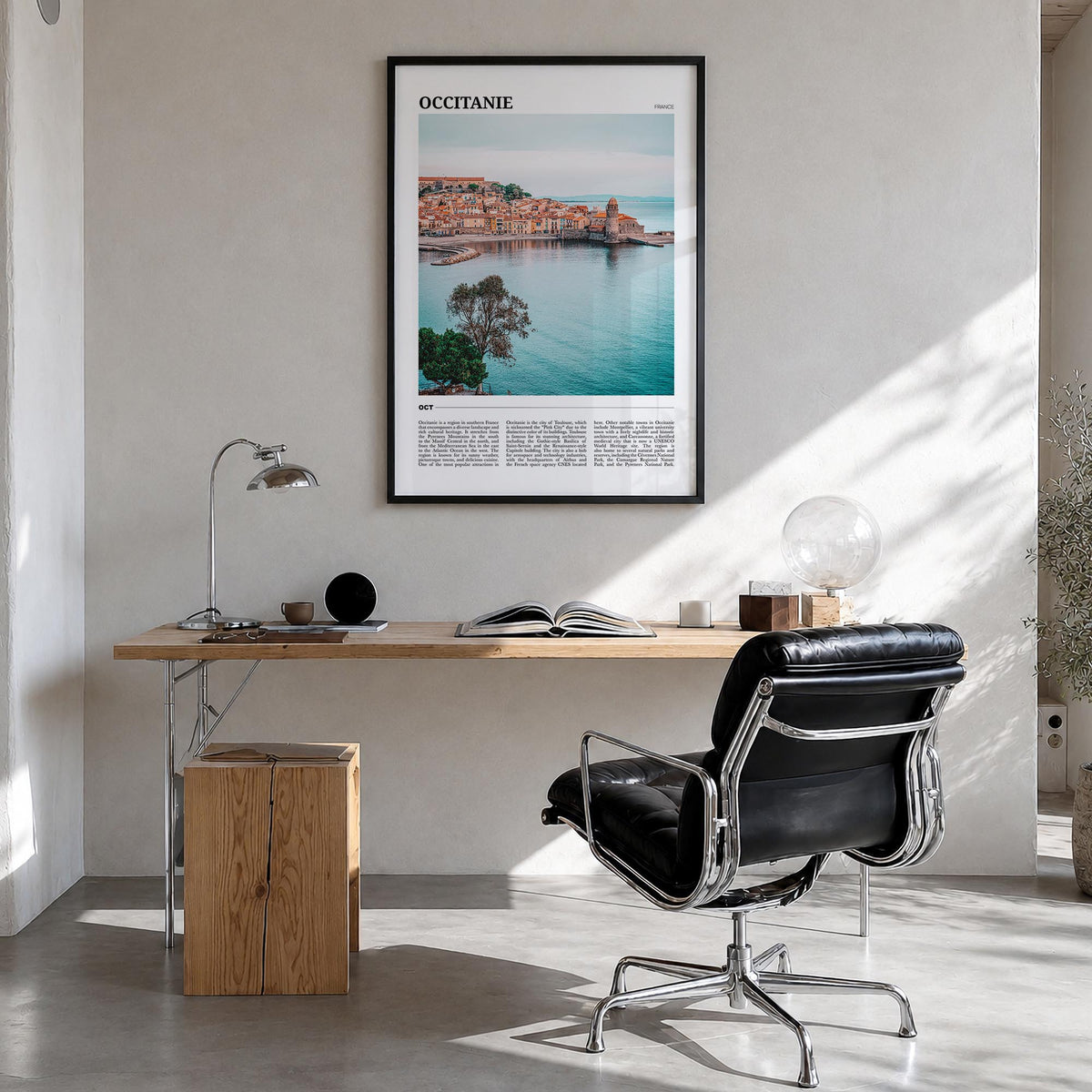 Occitanie colorful travel poster of France – vertical wall art in black wood frame, hanging on wall
