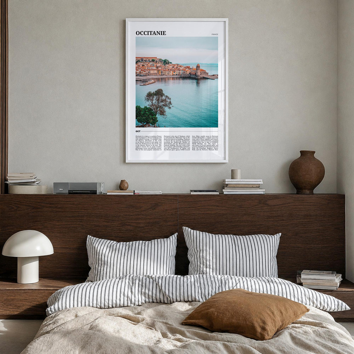 Occitanie colorful travel poster of France – vertical wall art in white wood frame, hanging on wall