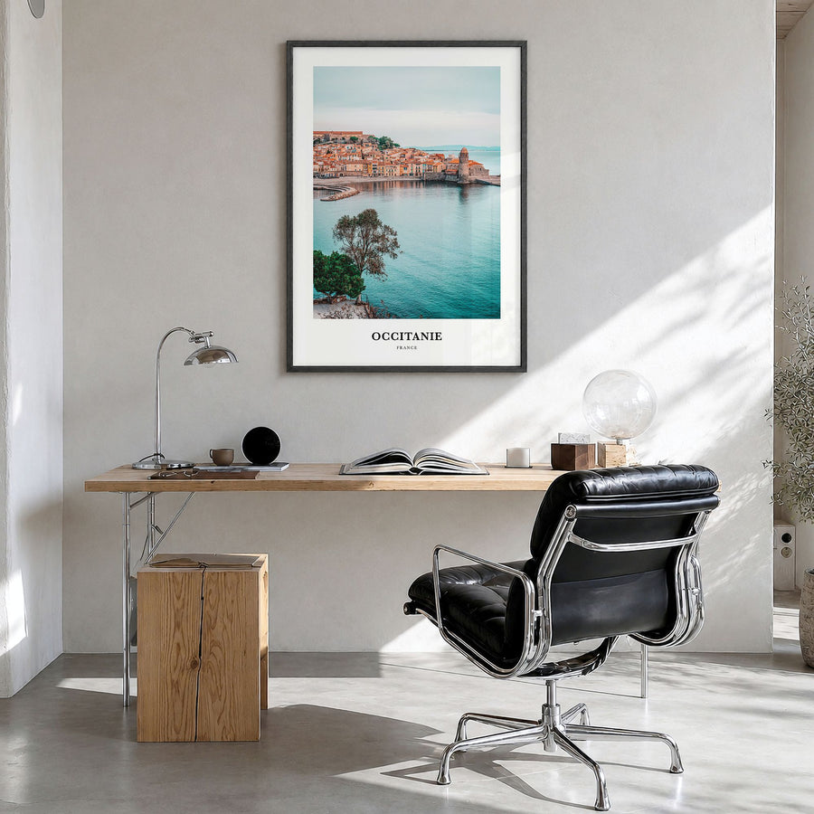 Occitanie Classic Poster in a black wood frame, hanging in a bright home office