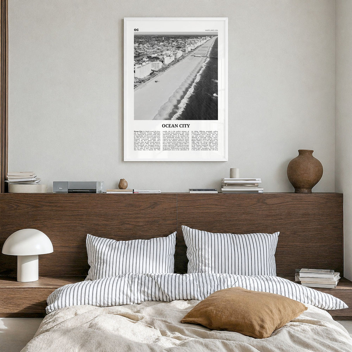 Ocean City, Maryland Newspaper Poster in a white wood frame, hanging in a bedroom