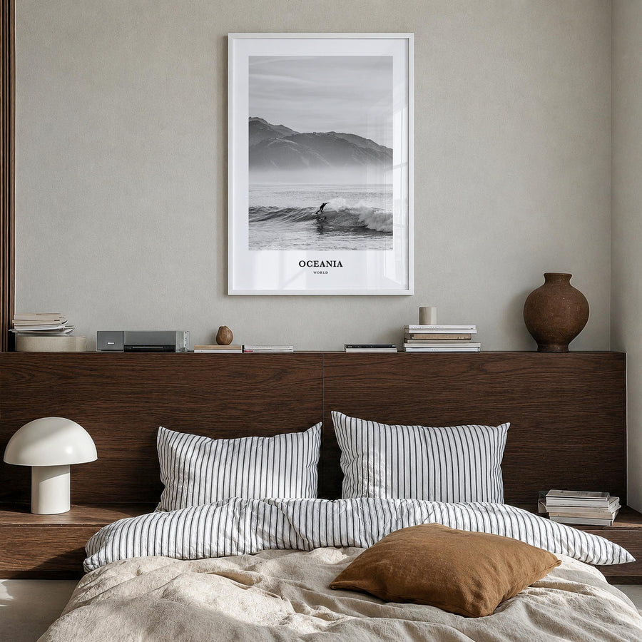 Oceania black & white classic poster – vertical wall art in white wood frame, hanging on wall