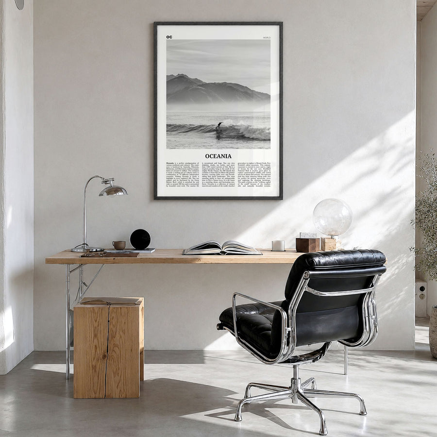 Oceania Newspaper Poster in a black wood frame, hanging in a bright home office