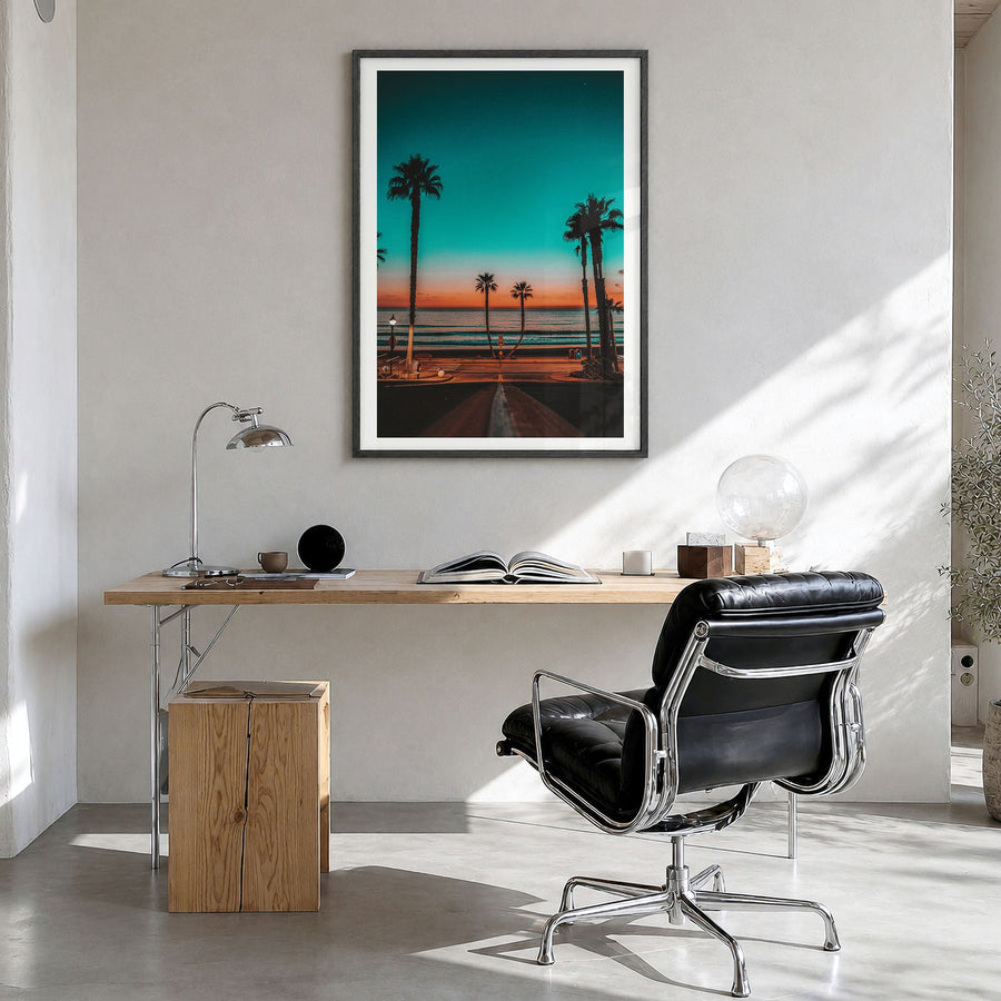Oceanside Photo No 1 Poster in a black wood frame, hanging in a bright home office, white border
