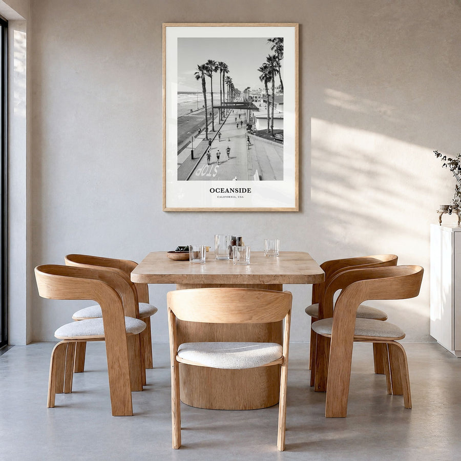 Oceanside Classic No 3 Poster in a natural wood frame, hanging in a dining room
