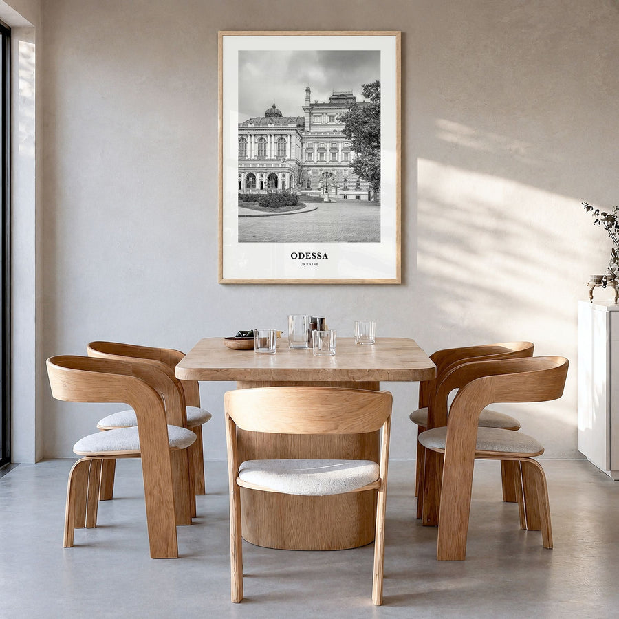 Odessa Classic Poster in a natural wood frame, hanging in a dining room
