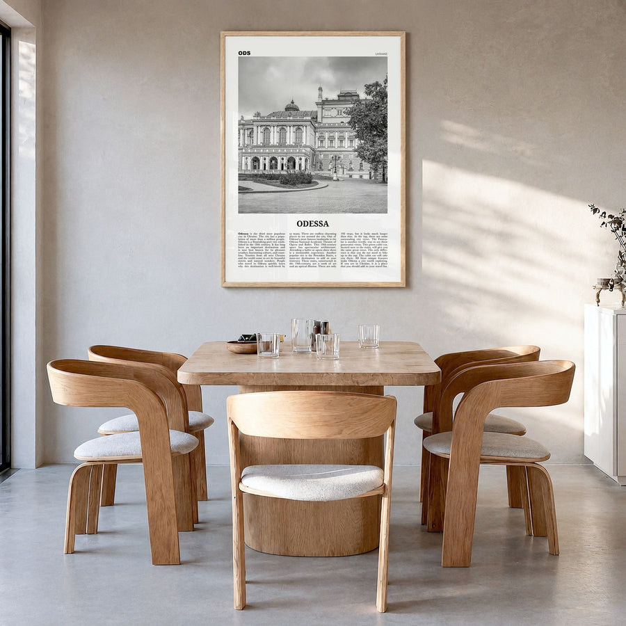 Odessa Newspaper Poster in a natural wood frame, hanging in a dining room