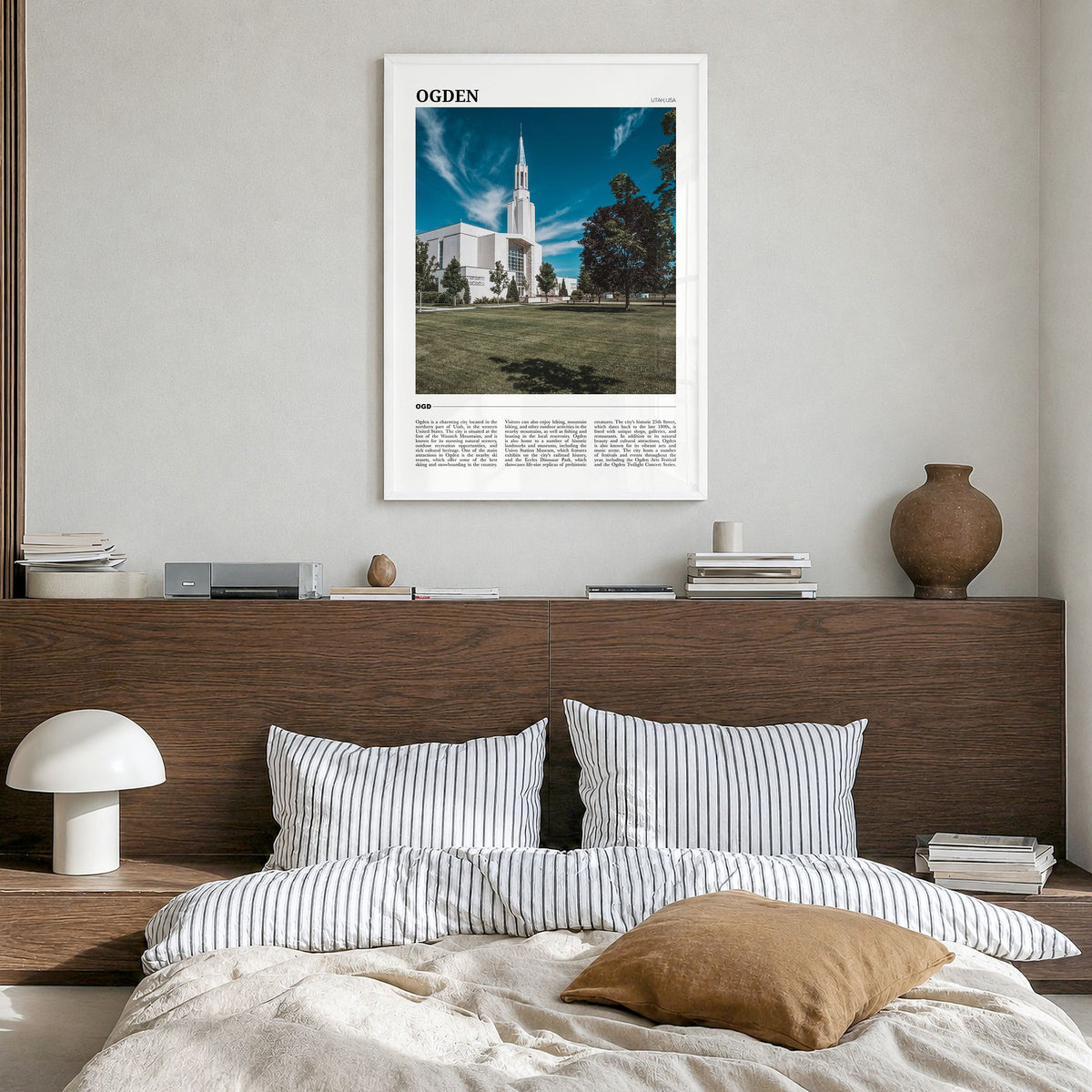 Ogden Travel Poster in a white wood frame, hanging in a bedroom
