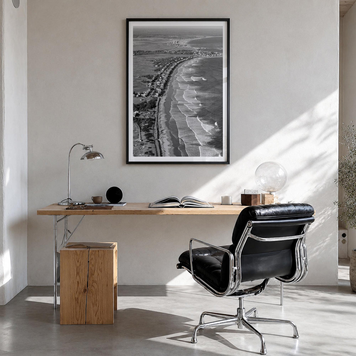 Ogunquit black & white photo poster of Maine, USA – vertical wall art in black wood frame with white border, hanging on wall