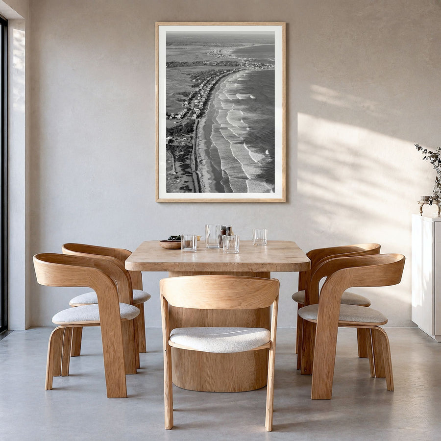 Ogunquit Photo Poster in a natural wood frame, hanging in a dining room, white border
