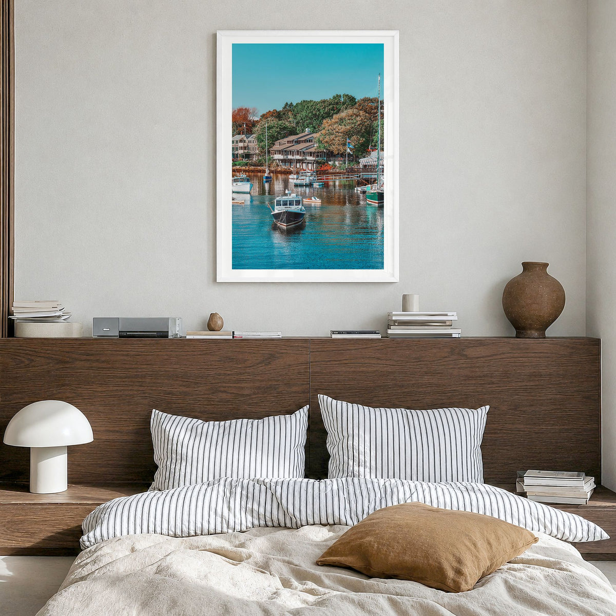 Ogunquit Photo Poster in a white wood frame, hanging in a bedroom, white border