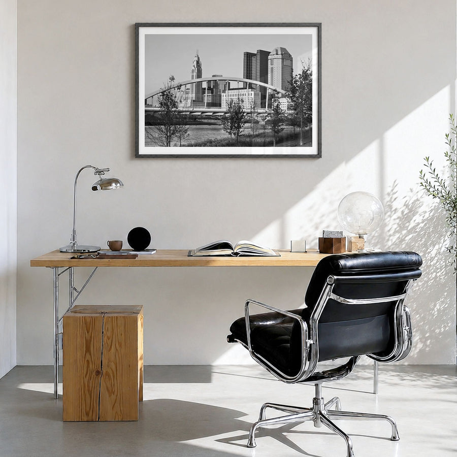 Ohio Photo Poster in a black wood frame, hanging in a bright home office, white border