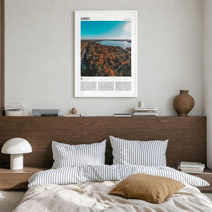 Ohio Travel Poster in a white wood frame, hanging in a bedroom