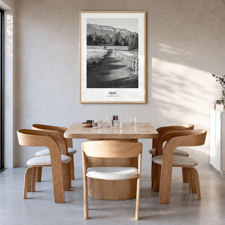 Ojai Classic Poster in a natural wood frame, hanging in a dining room