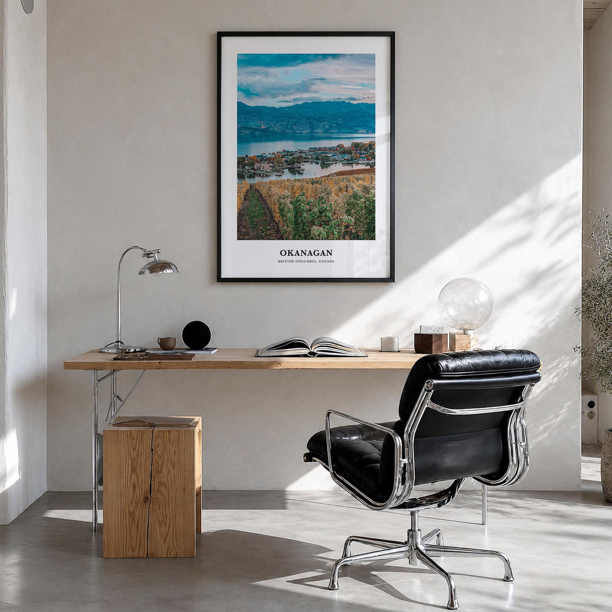 Okanagan colorful classic poster of British Columbia, Canada – vertical wall art in black wood frame, hanging on wall