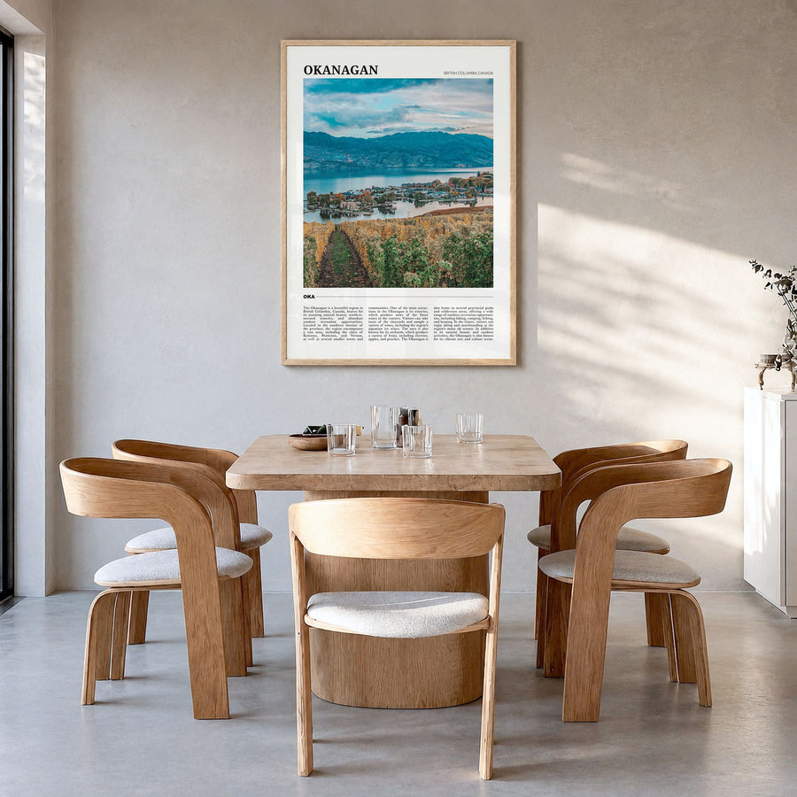 Okanagan Travel Poster in a natural wood frame, hanging in a dining room