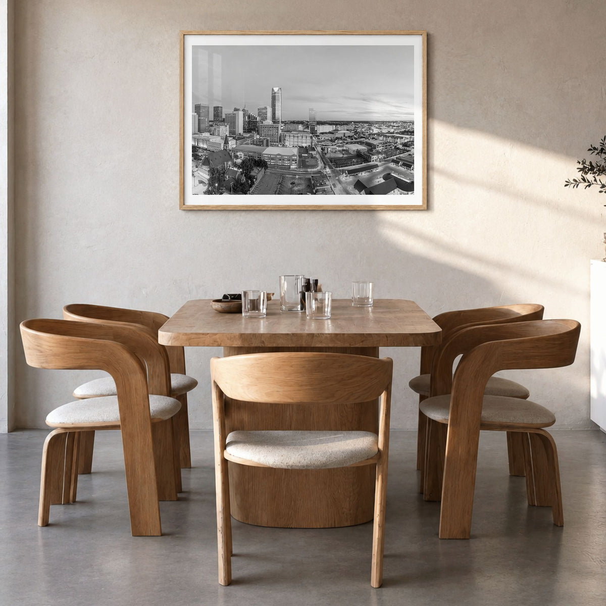 Oklahoma City Photo Poster in a natural wood frame, hanging in a dining room, white border
