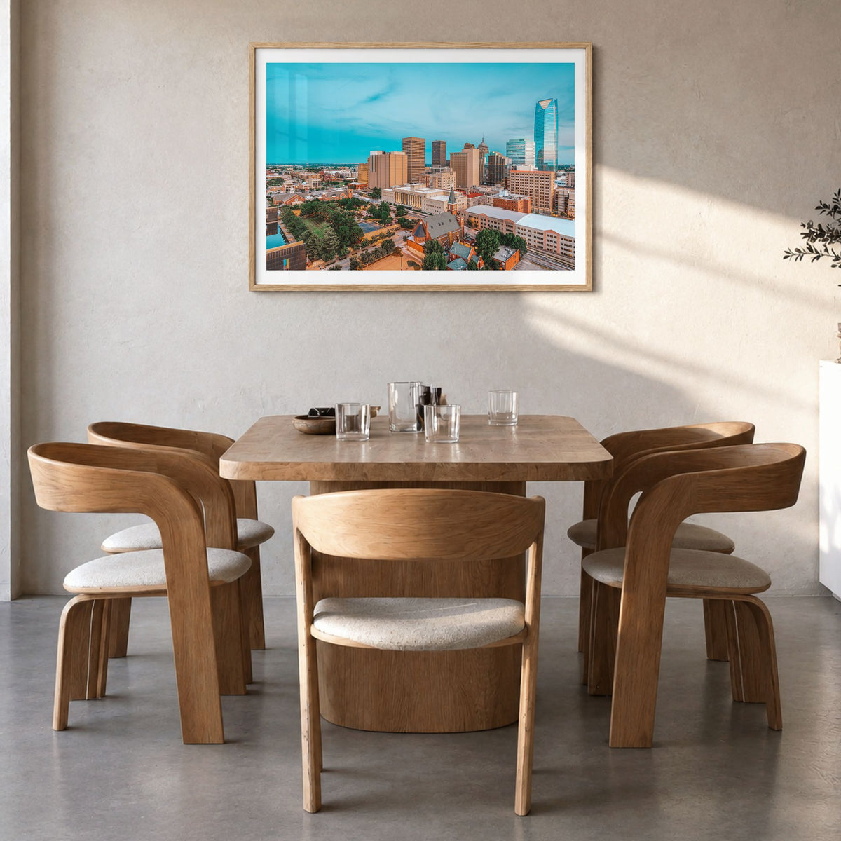 Oklahoma City Photo Poster in a natural wood frame, hanging in a dining room, white border