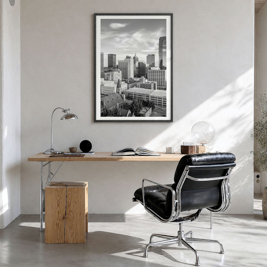Oklahoma City Photo Poster in a black wood frame, hanging in a bright home office, white border