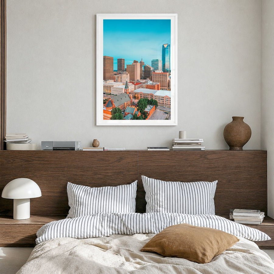 Oklahoma City Photo No 1 Poster in a white wood frame, hanging in a bedroom, white border