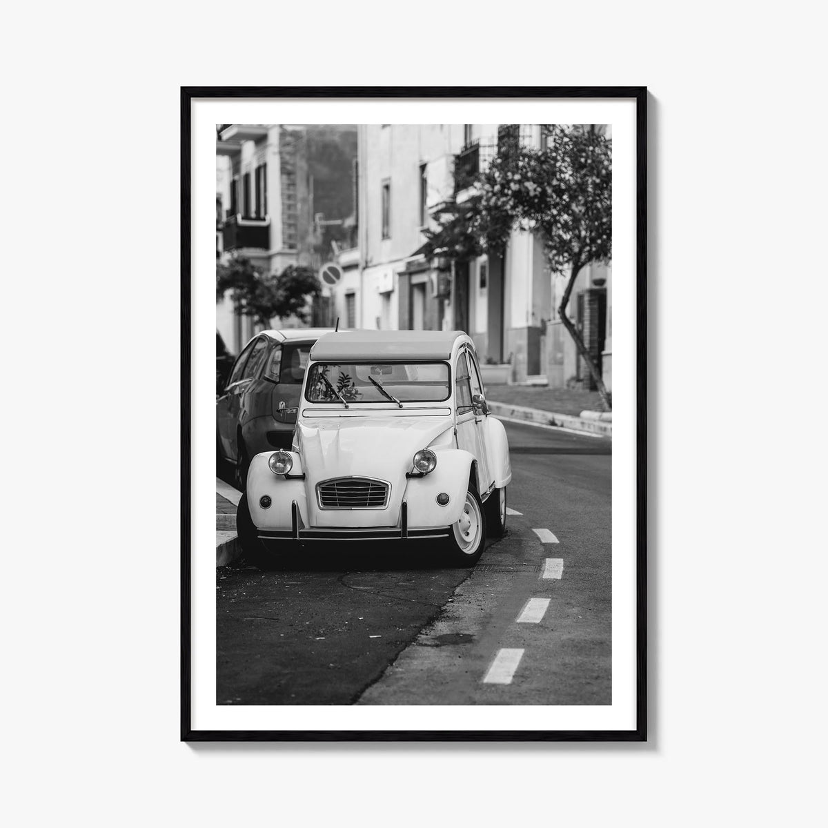 Old Car in Italy black & white photo poster – vertical wall art, unframed print shown in interior mockup