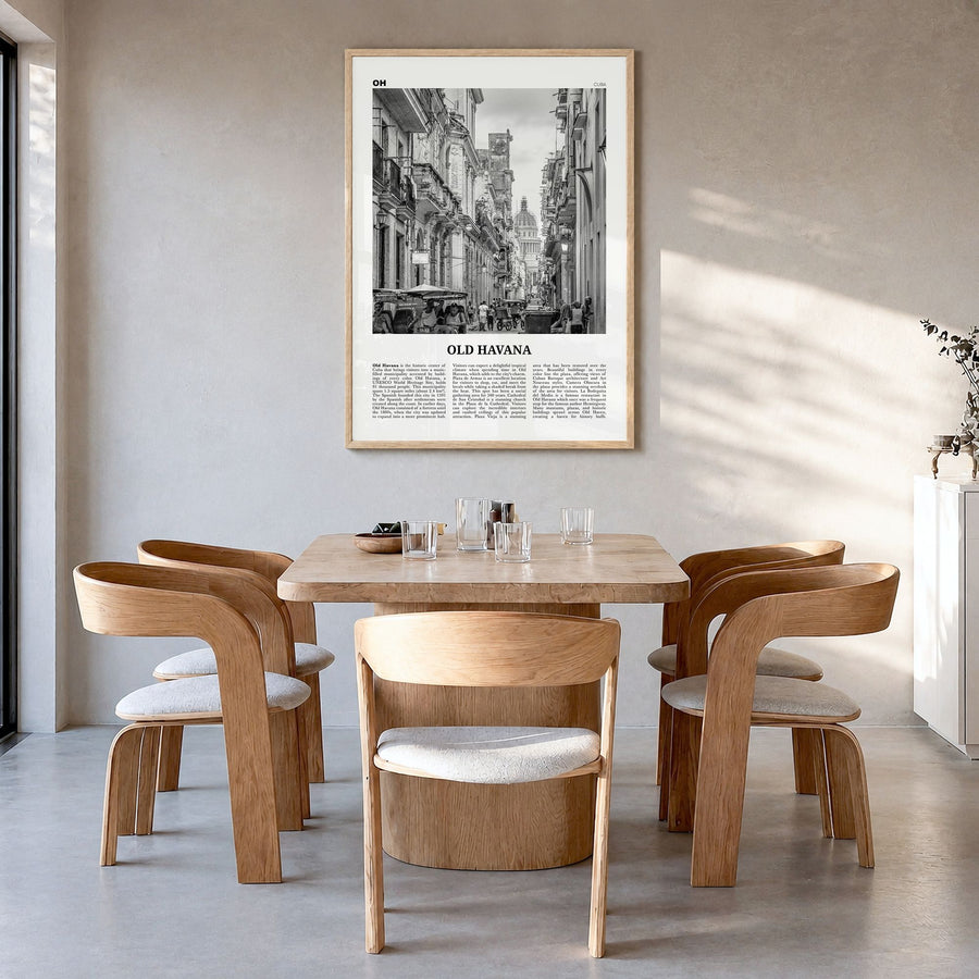 Old Havana Newspaper Poster in a natural wood frame, hanging in a dining room